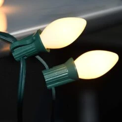 GOOTHY Indoor ＆ Outdoor String Light C7 Ceramic Christmas Replacement Bulbs,5 Watt-White -Xmas Lighting Shop 51ZlaPB3TqL. AC SL1001