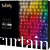 Twinkly Curtain – App-Controlled LED Christmas Lights With 210 RGB+W (16 Million Colors + Warm White) LEDs. 5 By 7 Feet. Clear Wire. Indoor And Outdoor Smart Lighting Decoration
