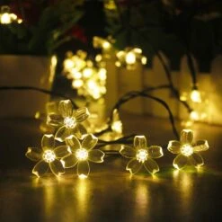 Mankinlu Solar Outdoor Cherry Blossom Strings Lights, 23 Feet 50 LEDs Solar Fairy Flower Lights Waterproof,Christmas Tree Lights,for Home, Lawn, Wedding, Patio,Party And Holiday Decorations Warm White -Xmas Lighting Shop 61nCp0AH6NL. AC SL1008
