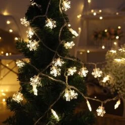 BIMOUR Christmas Lights, Snowflake String Lights 19.6 Ft 40 LED Fairy Lights Battery Operated Waterproof For Xmas Garden Patio Bedroom Party Decor Indoor Outdoor Celebration Lighting, Warm White -Xmas Lighting Shop 71 6U69G L. AC SL1280
