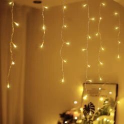 Qunlight Christmas Lights Outdoor IcicleLights 360LED 33FT 8 Modes, Connectable Hanging Fairy String Lights With 30V Plug In For Valentine Wedding Party Eave Garden Wall Decorations(Warm White) -Xmas Lighting Shop 710K4pl2cSL. AC SL1500