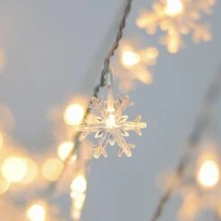 WATERGLIDE 2 Pack Christmas Snowflakes Lights, 50LED 24FT Outdoor Xmas Decorative String Lights, 8 Lighting Modes & Timer, Battery Operated Waterproof For Bedroom Party Garden Home Decor, Warm White -Xmas Lighting Shop 719XIBdMNkL. AC SL1500