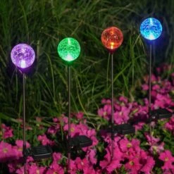 Solar Outdoor Lights - 4 Pack Crystal Glass LED Solar Garden Globe Lights, Color-Changing Solar Stake Lights Auto On/Off, Solar Pathway Lights For Landscape Patio Yard Walkway Christmas Decoration -Xmas Lighting Shop 71EkBMAwY0L. AC SL1500