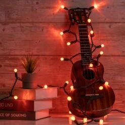 YULETIME Orange One-Piece G12 LED Christmas Lights, Total 48 Feet 140 Count 2 Strands 24ft 70ct Waterproof Raspberry String Light (Orange) -Xmas Lighting Shop 71UsTcqWOL. AC SL1500