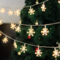 WATERGLIDE 2 Pack Christmas Snowflakes Lights, 50LED 24FT Outdoor Xmas Decorative String Lights, 8 Lighting Modes & Timer, Battery Operated Waterproof For Bedroom Party Garden Home Decor, Warm White -Xmas Lighting Shop 71VSwe5MbGL. AC SL1500