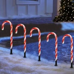 Dazzle Bright 12 Pack 16" Christmas Candy Cane Pathway Markers, Xmas Pathway Lights Outdoor With 72 Warm White Lights For Walkway Garden Lawn Holiday Decorations -Xmas Lighting Shop 71X9wpLS1L. AC SL1500