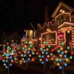 Windpnn 4-Pack Solar Snowflake Christmas Pathway Lights Multi-Color, Waterproof Christmas Garden Stake Lights Outdoor Solar Christmas Decorations Lights For Garden Yard Patio Lawn Pathway -Xmas Lighting Shop 71YveEOMiQL. AC SL1500