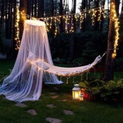 Orangie LED Icicle Lights, 96 LEDs 11.4ft 8 Modes, Curtain Fairy Light, LED String Light For Wedding/Christmas/Halloween/Thanksgiving/Easter/Party Backdrops Family Patio Lawn Decoration(Warm White) -Xmas Lighting Shop 71aDQ0ybrPL. AC SL1001