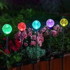 Solar Outdoor Lights - 4 Pack Crystal Glass LED Solar Garden Globe Lights, Color-Changing Solar Stake Lights Auto On/Off, Solar Pathway Lights For Landscape Patio Yard Walkway Christmas Decoration -Xmas Lighting Shop 71c865d9LVL. AC SL1500