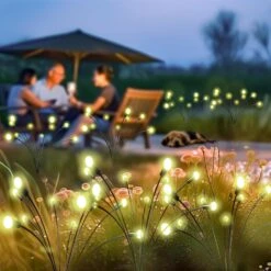 GREMBEB 【Upgrade】 Solar Garden Lights Outside, 4Pack 40 LED Path Swaying Solar Powered Firefly Lights Outdoor Waterproof Decorative Stake Yard Patio Landscape Christmas Decor(+ 4 Extra Spare Battery)