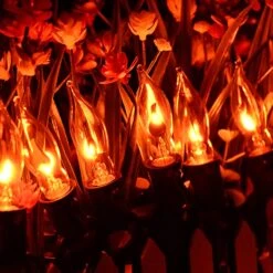 Couah Christmas Flickering String Lights, 10FT Flickering Amber Flame C7 Christmas String Lights Outdoor Decoration Lights For Christmas Tree - Black Wire -Xmas Lighting Shop 71d4SznvQL. AC SL1500