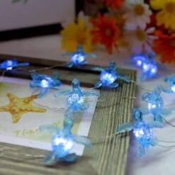JASHIKA Blue Sea Turtle String Lights Christmas Nautical Wall Décor 10ft 30 LEDs With Remote Powered By USB Plug-in For Summer Ocean Themed Wedding Baby Shower Birthday Party House Decoration -Xmas Lighting Shop 71iwO6rjfeL. AC SL1500