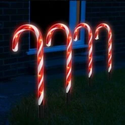 Dazzle Bright 12 Pack 16" Christmas Candy Cane Pathway Markers, Xmas Pathway Lights Outdoor With 72 Warm White Lights For Walkway Garden Lawn Holiday Decorations -Xmas Lighting Shop 71nuXZzHqHL. AC SL1500