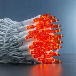 GOODFAITH White Wire ULcertified Outdoor Christmas Lights 100 Lights 22.6ft (100 Lights 22.6ft 1 Pack) Commercial Grade Christmas Lights (White Wire Golden Light) -Xmas Lighting Shop 71u2U9XLi6L. AC SL1500