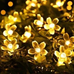 Fairy Lights Christmas Decorative Flower String Lights 33 Feet 100 LEDs, 8 Flash Modes With Tail Plug Connectable Cherry Flower Decorations Novelty Light For Party, Patio, Wedding, Home And Garden -Xmas Lighting Shop 71yF2qqwpL. AC SL1002