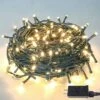 Upgraded 82FT 200 LED Christmas String Lights Outdoor/Indoor, Extendable Green Wire, Memory Function & Timer & 8 Modes, Waterproof Fairy String Lights For Xmas Tree Holiday Party Garden (Warm White)