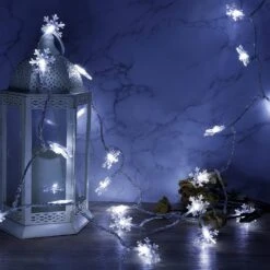 Twinkle Star 100 LED Christmas Snowflake String Lights, 49 FT Plug In Fairy Light Waterproof, Extendable For Indoor Outdoor Holiday Wedding Party, Xmas Tree, New Year, Garden Decorations (White) 9 Twinkle Star 100 LED Christmas Snowflake String Lights, 49 FT Plug In Fairy Light Waterproof, Extendable For Indoor Outdoor Holiday Wedding Party, Xmas Tree, New Year, Garden Decorations (White) -Xmas Lighting Shop 81HP7IQSHSL. AC SL1500