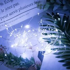 Minetom 100 LEDs Fairy Lights 33 Ft Firefly String Lights Waterproof Starry Lights On Silver Coated Copper Wire Perfect For Christmas Party DIY Wedding Bedroom Indoor Party Decorations Pure White -Xmas Lighting Shop 81JaTHneuDL. AC SL1500