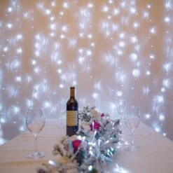 Oopswow 304L Curtain String Lights,9.8ft X 9.8ft 8 Modes Curtain Lights For Bedroom,Hanging Twinkle Fairy Lights Plug In Window Lights For Backdrop Christmas Party Wedding Outdoor Indoor Wall Decor -Xmas Lighting Shop 81YKvyyQUL. AC SL1500