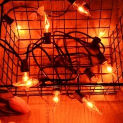 Couah Christmas Flickering String Lights, 10FT Flickering Amber Flame C7 Christmas String Lights Outdoor Decoration Lights For Christmas Tree - Black Wire -Xmas Lighting Shop 81cvIo4GwTL. AC SL1500