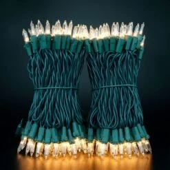 YULETIME Clear Christmas Lights With Green Wire, 66 Feet 200 Count UL Certified String Lights, Pack Of 2 Sets 33 Ft 100 Count Incandescent Mini Light Set (Clear) -Xmas Lighting Shop 81e5yYb SML. AC SL1500