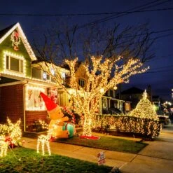 JMEXSUSS 500 LED Christmas Lights Outdoor, 173ft 8 Modes Christmas Tree Lights Green Wire, Waterproof Christmas String Lights Plug In For Indoor Party Wedding Xmas Decorations(Warm White) -Xmas Lighting Shop 81eH iplJ0L. AC SL1500