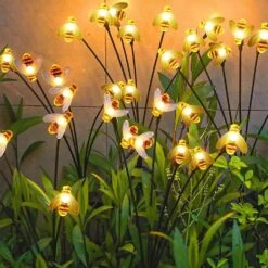 WOBILOO Solar Outdoor Garden Lights - 4 Pack 10 LED Solar Bee Firefly Lights With 2 Lighting Modes,Solar Swaying Lights,Waterproof Solar Powered Lights For Yard Patio Pathway Christmas Decoration