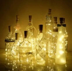 Decorman 10 Pack Solar Powered Wine Bottle Lights, 10 LED Waterproof Copper Cork Shaped Lights For Wedding/Christmas/Outdoor/Holiday/Garden/Patio/Yard/Pathway Decor (Warm White) -Xmas Lighting Shop 81wuYoSzcaL. AC SL1500