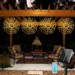4 Pack Hanging Solar Firework Lights 480 LED Christmas Starburst Lights Copper Wire Outdoor Waterproof Lights 8 Modes Remote Control Fairy Decorative Lights For Patio, Eave, Garden Tree (Warm)