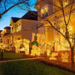 JMEXSUSS 66ft 200 LED Christmas Lights Outdoor, Warm White String Lights Green Wire, 8 Modes Christmas String Lights Plug In For Outside Tree Bedroom Wedding Party Christmas Indoor Decorations -Xmas Lighting Shop 91MFtnVWimL. AC SL1500